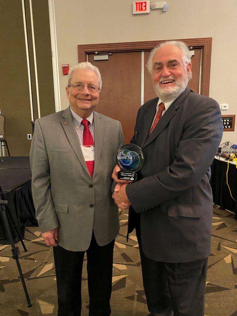 Chester Lowder (left) receives the 2021 NC Foundation for Soil and Water Conservation President's Award