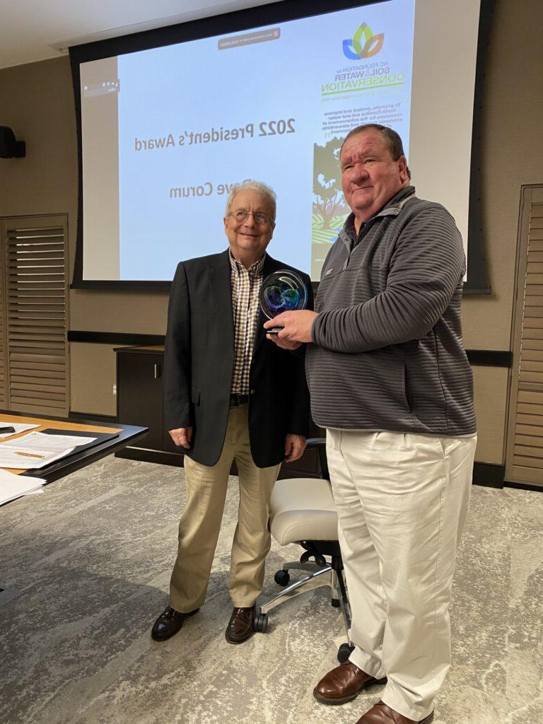 Dave Corum (left) receives the 2022 NC Foundation for Soil and Water Conservation President's Award